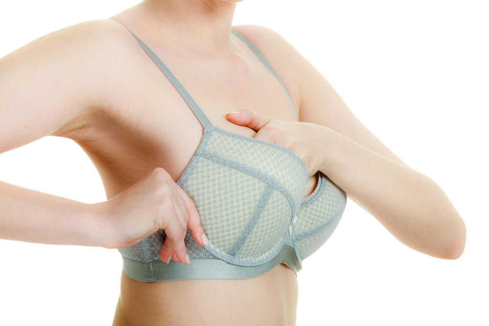 Woman Adjusting Bra