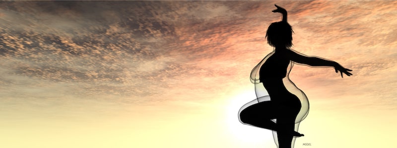 Silhouette of a woman against sunset, showing weight loss concept