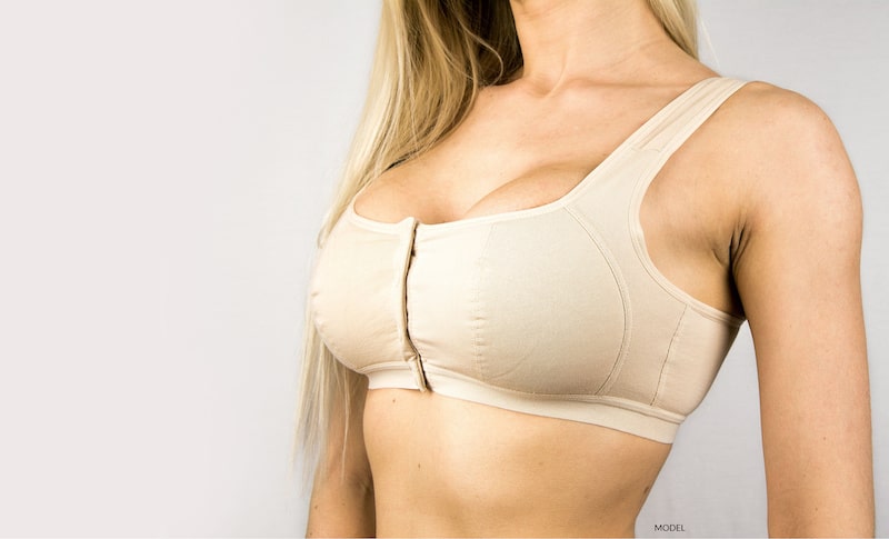 Woman wearing a compression bra 